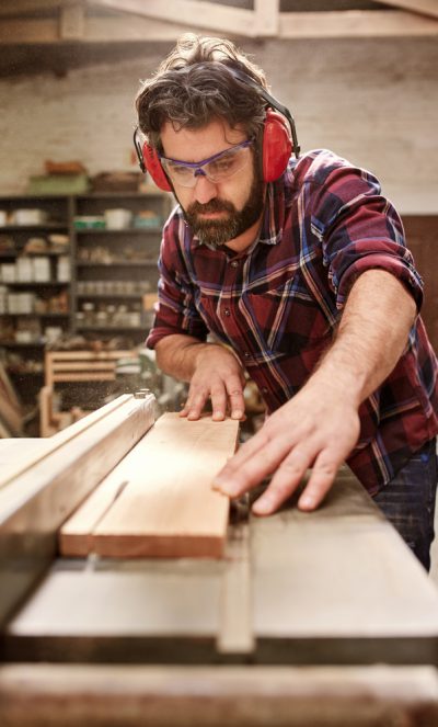 Carpenter working with wood